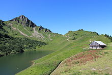 https://upload.wikimedia.org/wikipedia/commons/thumb/9/96/Lac_de_Lessy.JPG/220px-Lac_de_Lessy.JPG