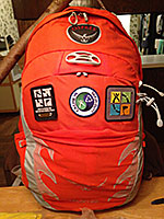 Big Orange Geocaching Backpack of Holding
