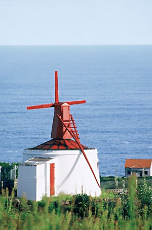 An old style windmill Moinho de Vento in a rural area in Algarve