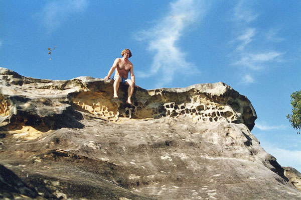 BFJ sitting on a rock overhang