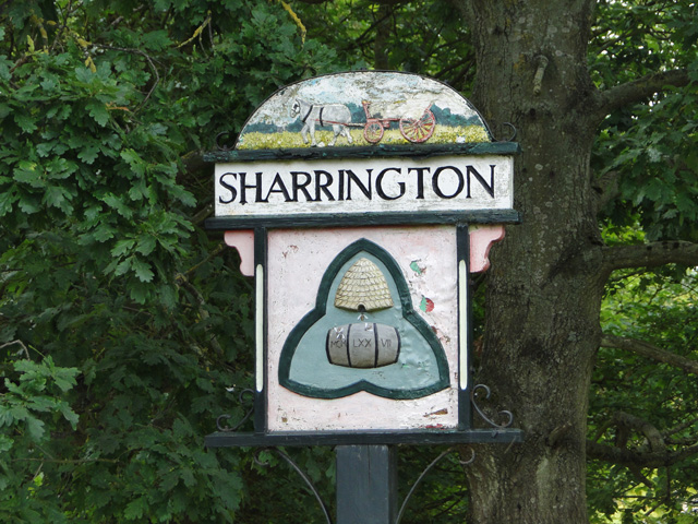 Sharrington village sign (detail)